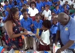 Distributing School Supplies at Plain View Combined School