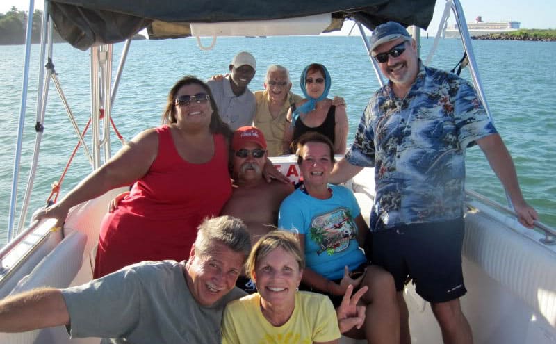 Guests having a good time aboard a speedboat on Spencer Ambrose Tours, St. Lucia